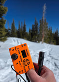 (tr)uSDX and Turret Mic surrounded by snow and trees. Thanks to Josh, W0RTA for the picture!